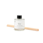 Baies reed diffuser, offering a bright and fresh blend of red currant and rose. A luxurious home fragrance that fills your space with a vibrant and uplifting aroma.