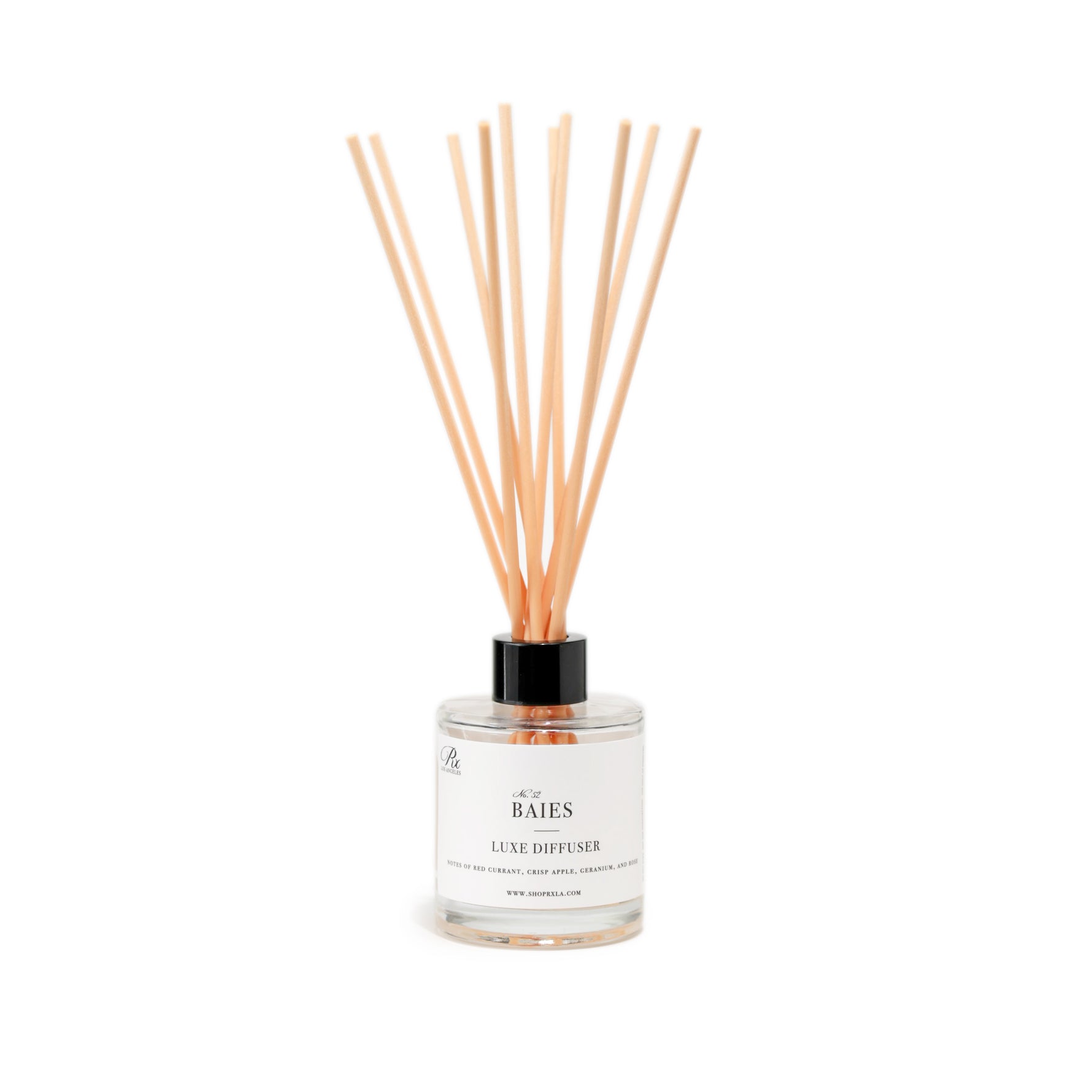 Baies reed diffuser, offering a bright and fresh blend of red currant and rose. A luxurious home fragrance that fills your space with a vibrant and uplifting aroma.