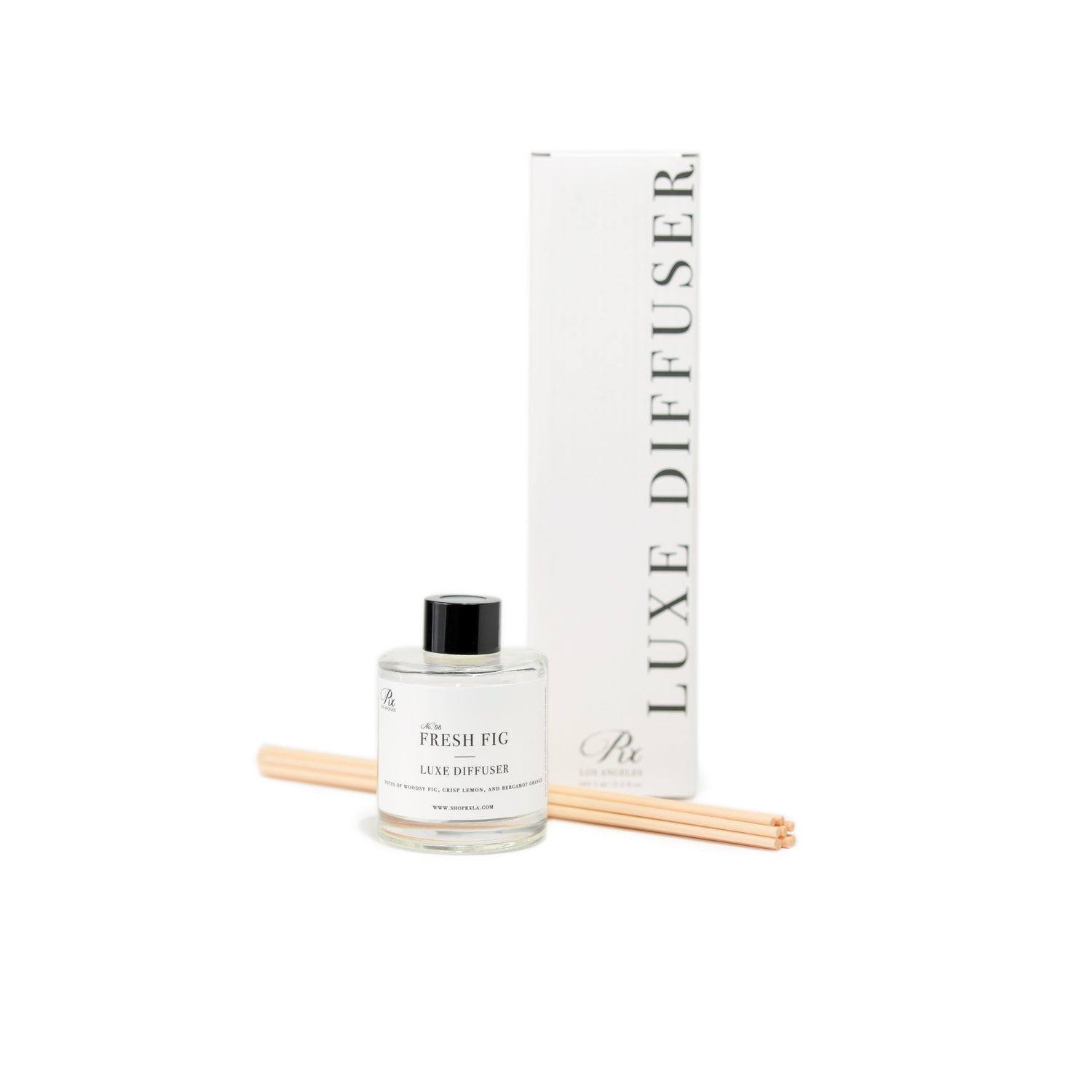 Fresh Fig reed diffuser, featuring an earthy blend of fresh fig, moss, and patchouli. This elegant diffuser creates a calming ambiance with its rich, natural scent, perfect for enhancing your home environment