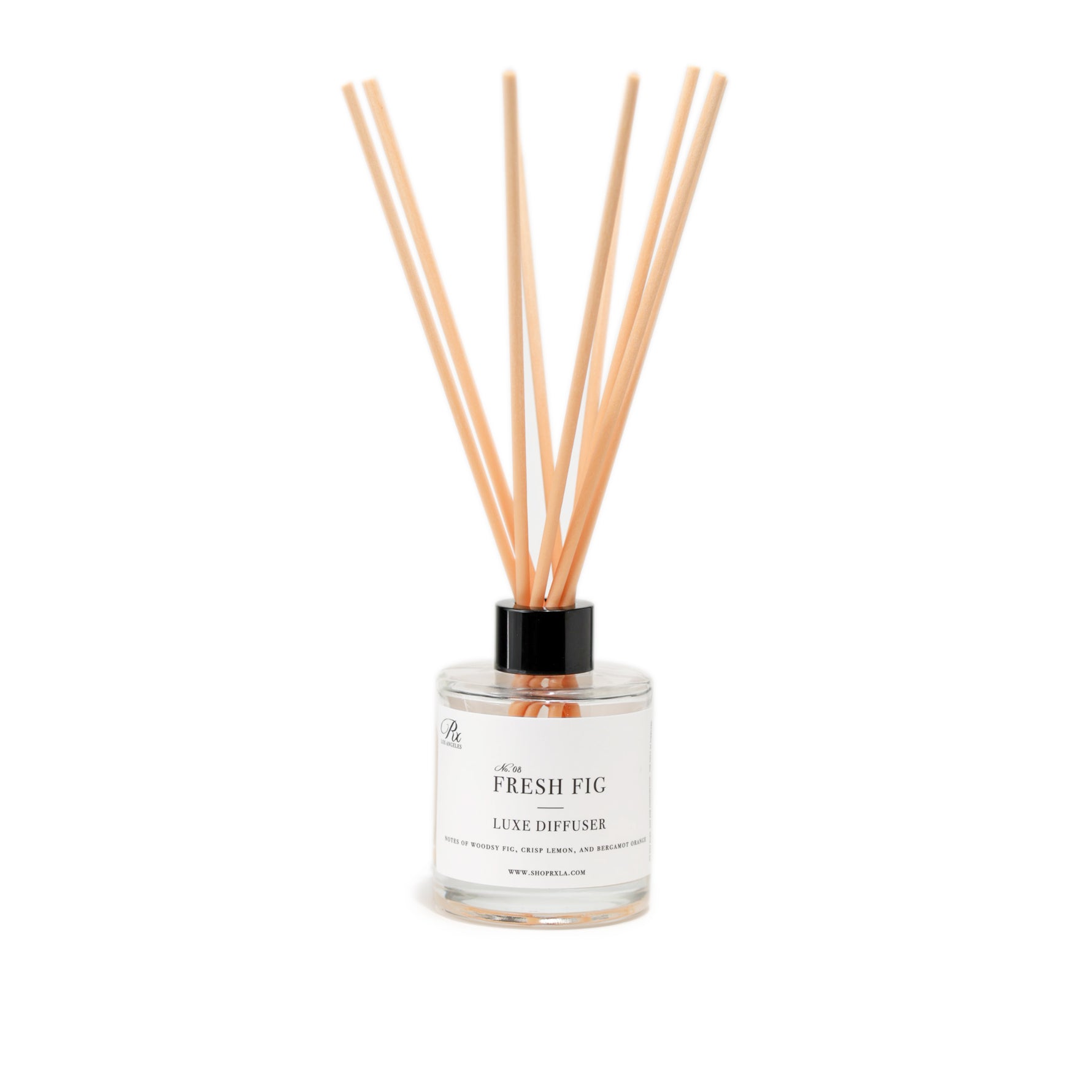 Fresh Fig reed diffuser, featuring an earthy blend of fresh fig, moss, and patchouli. This elegant diffuser creates a calming ambiance with its rich, natural scent, perfect for enhancing your home environment