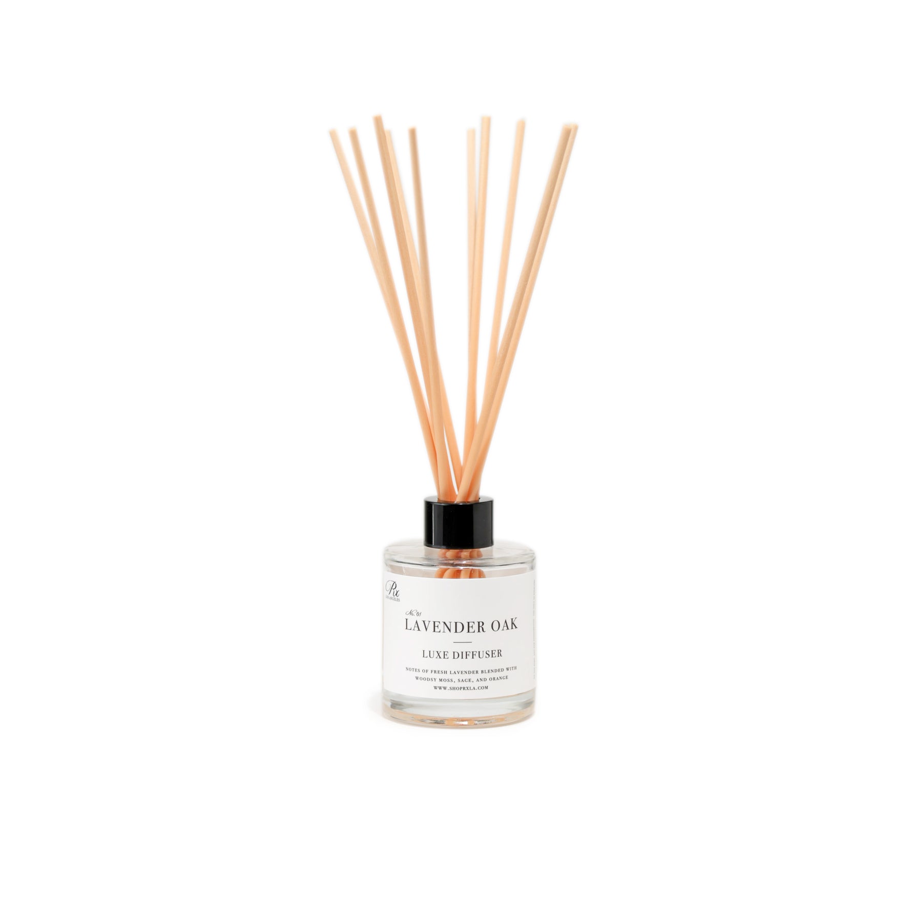 Lavender Oak diffuser with reeds, featuring a calming blend of French lavender, earthy moss, sage, and a hint of bright orange. This fragrance evokes a peaceful, natural retreat, perfect for relaxation and unwinding