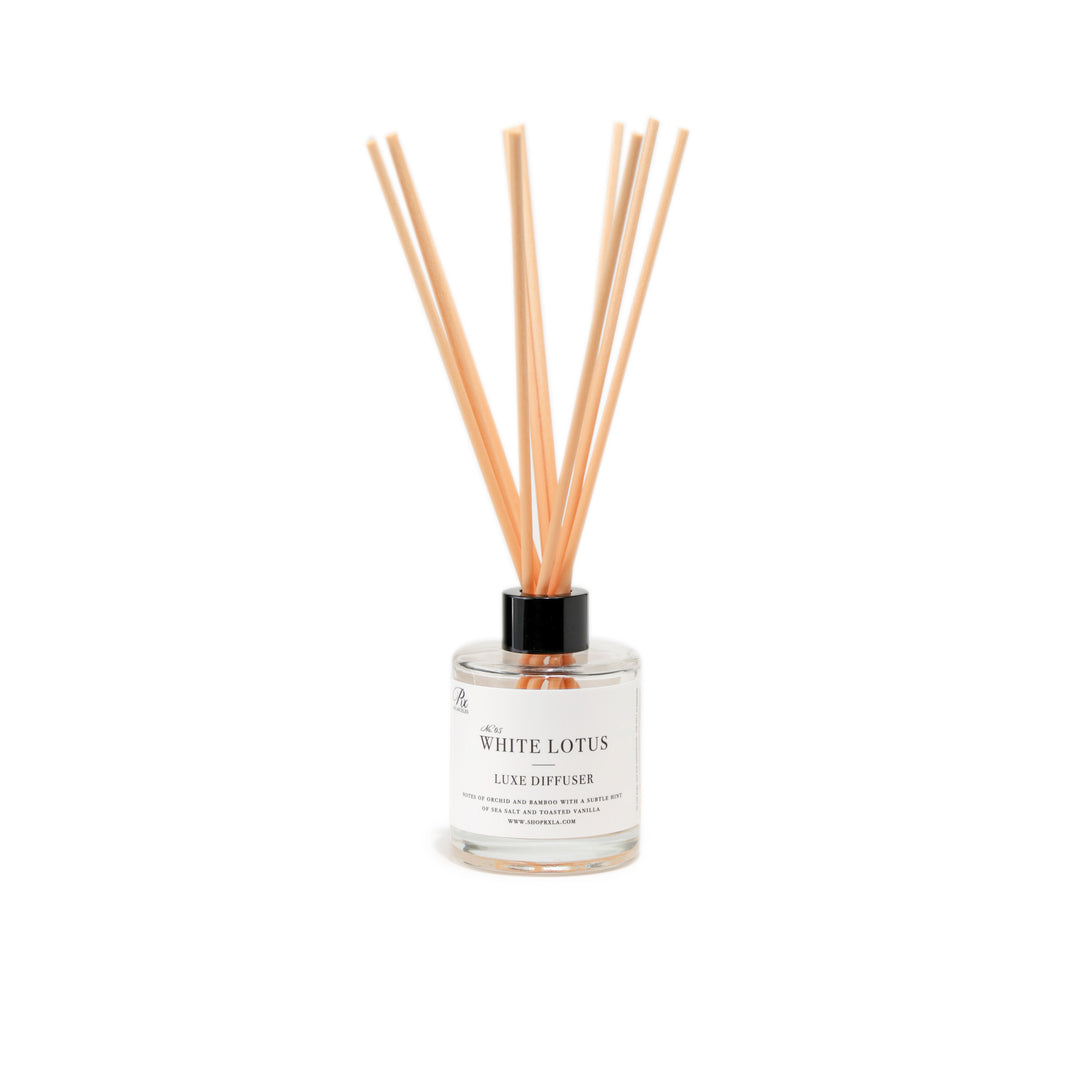 Transform your space with our White Lotus reed diffuser, inspired by luxurious escapes. This elegant fragrance blends notes of orchid and bamboo with hints of sandalwood and sea salt, creating a serene and soothing atmosphere that transports you to paradise