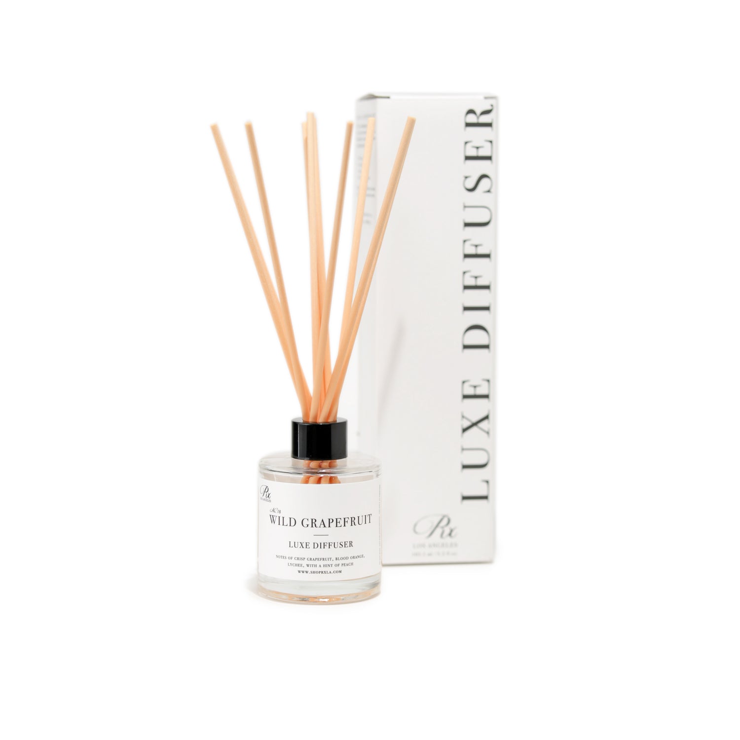 Wild Grapefruit diffuser, featuring a fresh and invigorating fragrance with bright citrus notes of grapefruit, balanced by subtle hints of green leaves and a touch of sweetness, perfect for energizing any room.