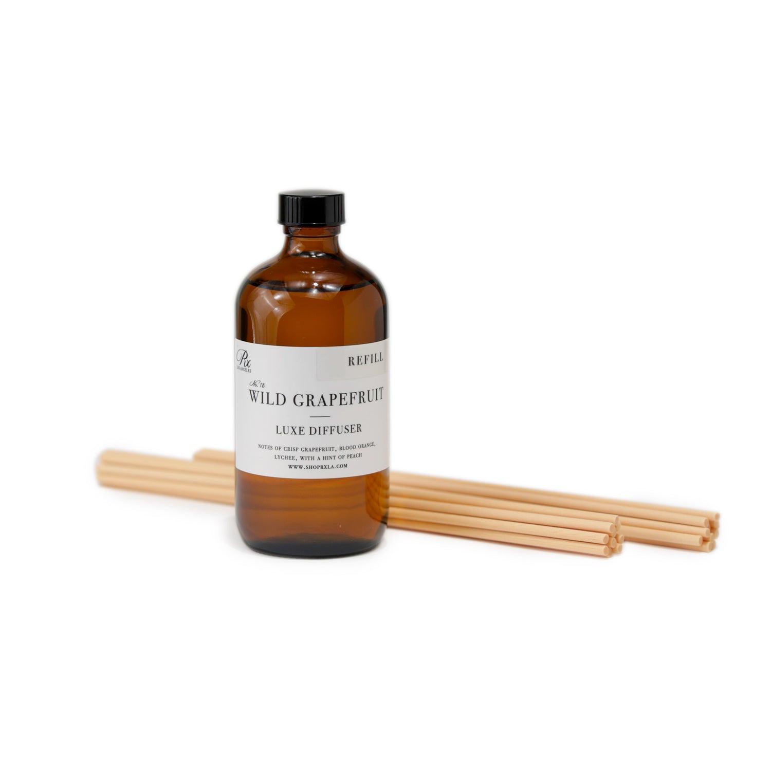 Reed diffuser refill bottle filled with premium fragrance oil, designed to refresh your diffuser and maintain a consistent, long-lasting scent in your space